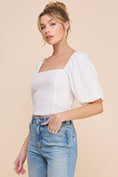 Load image into Gallery viewer, Julie Jacquard Knit Crop Top in soft off-white with romantic square neckline, puff sleeves, and fitted crop design, perfect for pairing with high-waist bottoms.