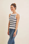 Load image into Gallery viewer, Side profile of model in a navy and white striped tank top, showcasing its boat neck and lightweight, breathable fabric.