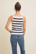 Load image into Gallery viewer, Back profile of model in a navy and white striped tank top, showcasing its boat neck and lightweight, breathable fabric.