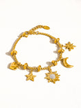 Load image into Gallery viewer, Elara Star and Moon Charm Bracelet
